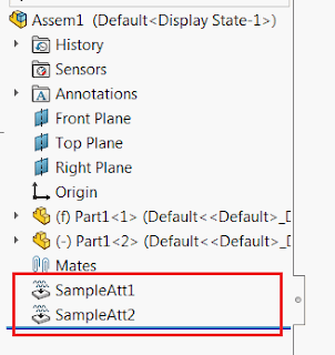 Two attributes features created in the Feature Manager Tree using SOLIDWORKS API